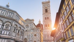 Cathedral of Santa Maria del Fiore complex with Giotto's Bell Tower and San Giovanni Baptistery in Florence, Italy, illuminated by late afternoon sun. architectural travel from Venice to Florence - Silver Magazine www.silvermagazine.co.uk