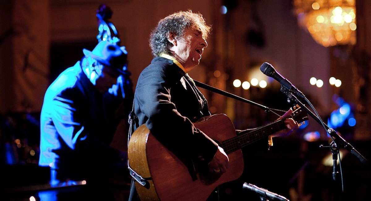 Bob Dylan performing on stage