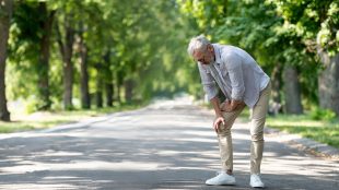 Mature Man Gentleman Having Osteoarthritis, Standing On Path And Rubbing Painful Area, Feeling Unwell During Outside Walk. How to know if you're struggling with arthritis - Silver Magazine www.silvermagazine.co.uk