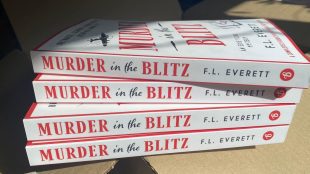 A stack of four Murder in the Blitz books in the sun. Interview with author F.R. Everett of the Edie York mystery series.