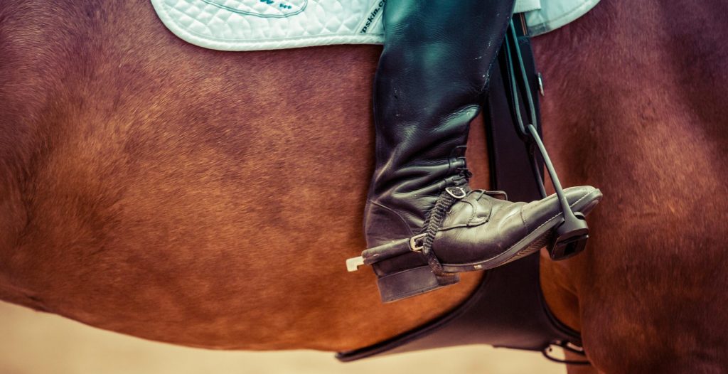 Foot in stirrup - Horse riding as exercise article -Silver Article www.silvermagazine.co.uk