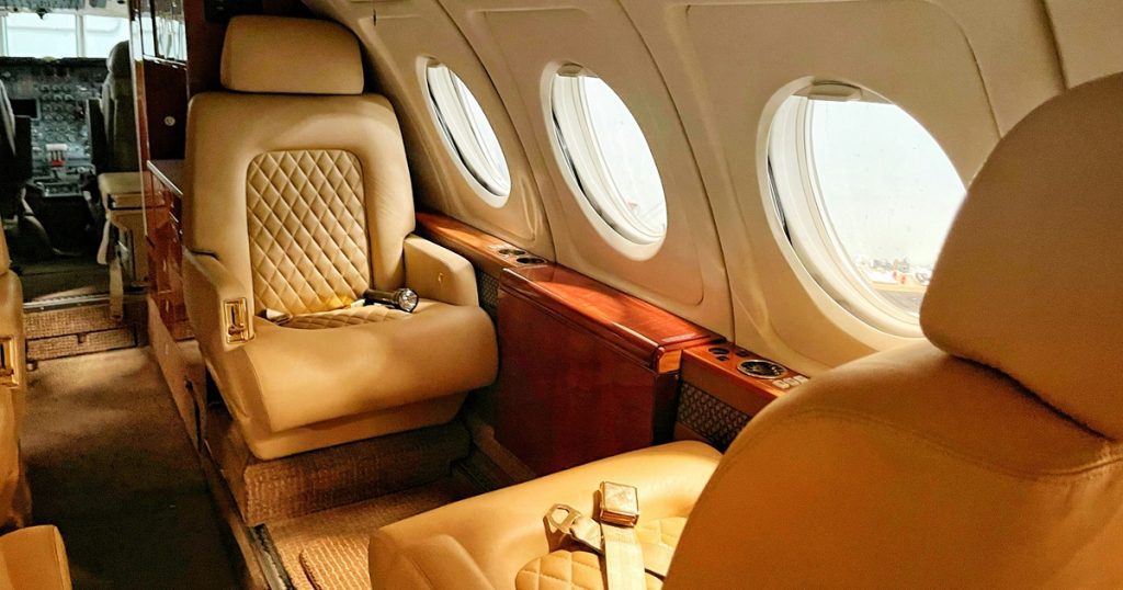 Showing inside cabin of private plane. Private flying for long haul destinations article Silver Magazine www.silvermagazine.co.uk