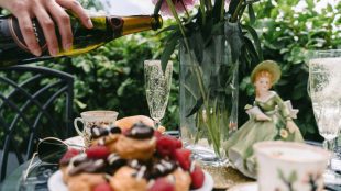 Summer garden champagne and a stack of fresh profiteroles