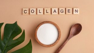 Image shows the word collagen spelt out in tiles, with a leaf and a spoon and a small pot of powdered collagen