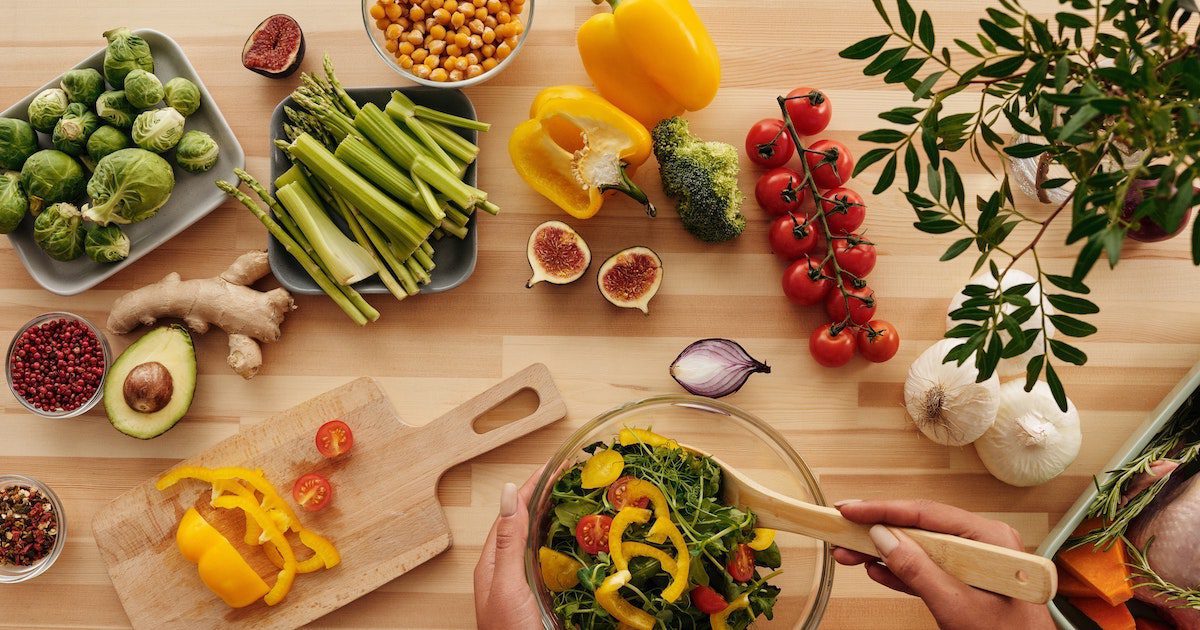 Colourful vegetable board. Healthy eating tips on Silver.